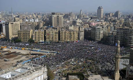 Egyptian Protesters in Tahrir Square. (Photo Courtesy of The Guardian).